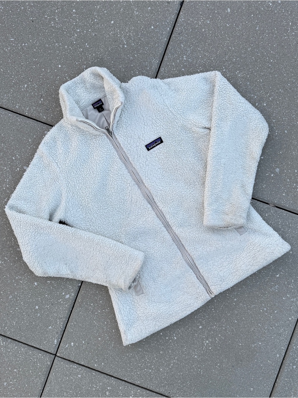 White Patagonia women’s fleece jacket
